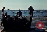 Image of Wounded marines carried to Higgins boats Iwo Jima, 1945, second 52 stock footage video 65675056725