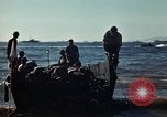 Image of Wounded marines carried to Higgins boats Iwo Jima, 1945, second 54 stock footage video 65675056725