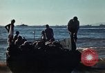 Image of Wounded marines carried to Higgins boats Iwo Jima, 1945, second 58 stock footage video 65675056725