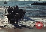 Image of Wounded marines carried to Higgins boats Iwo Jima, 1945, second 59 stock footage video 65675056725