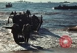 Image of Wounded marines carried to Higgins boats Iwo Jima, 1945, second 60 stock footage video 65675056725