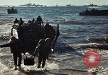 Image of Wounded marines carried to Higgins boats Iwo Jima, 1945, second 61 stock footage video 65675056725