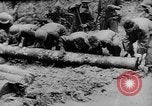 Image of US Soldiers labor and haul equipment Pacific Theater, 1944, second 4 stock footage video 65675056745