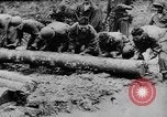 Image of US Soldiers labor and haul equipment Pacific Theater, 1944, second 5 stock footage video 65675056745