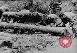 Image of US Soldiers labor and haul equipment Pacific Theater, 1944, second 6 stock footage video 65675056745