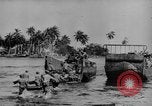 Image of US Soldiers labor and haul equipment Pacific Theater, 1944, second 9 stock footage video 65675056745