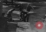 Image of US Soldiers labor and haul equipment Pacific Theater, 1944, second 14 stock footage video 65675056745