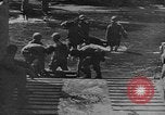 Image of US Soldiers labor and haul equipment Pacific Theater, 1944, second 16 stock footage video 65675056745