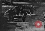 Image of US Soldiers labor and haul equipment Pacific Theater, 1944, second 17 stock footage video 65675056745