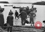 Image of US Soldiers labor and haul equipment Pacific Theater, 1944, second 18 stock footage video 65675056745