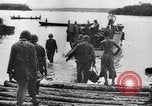 Image of US Soldiers labor and haul equipment Pacific Theater, 1944, second 19 stock footage video 65675056745