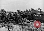 Image of US Soldiers labor and haul equipment Pacific Theater, 1944, second 25 stock footage video 65675056745