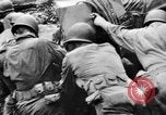 Image of US Soldiers labor and haul equipment Pacific Theater, 1944, second 42 stock footage video 65675056745