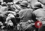 Image of US Soldiers labor and haul equipment Pacific Theater, 1944, second 43 stock footage video 65675056745