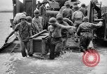 Image of US Soldiers labor and haul equipment Pacific Theater, 1944, second 45 stock footage video 65675056745
