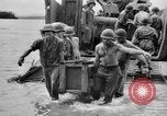 Image of US Soldiers labor and haul equipment Pacific Theater, 1944, second 47 stock footage video 65675056745