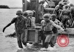 Image of US Soldiers labor and haul equipment Pacific Theater, 1944, second 48 stock footage video 65675056745