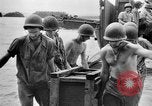 Image of US Soldiers labor and haul equipment Pacific Theater, 1944, second 52 stock footage video 65675056745