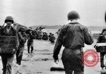 Image of US Soldiers labor and haul equipment Pacific Theater, 1944, second 57 stock footage video 65675056745