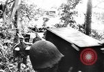 Image of US Soldiers labor and haul equipment Pacific Theater, 1944, second 59 stock footage video 65675056745