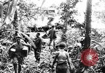 Image of US Soldiers labor and haul equipment Pacific Theater, 1944, second 60 stock footage video 65675056745