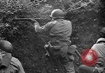 Image of US Army soldiers and Marines in combat World War 2 Pacific Theater, 1944, second 3 stock footage video 65675056746