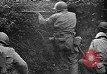 Image of US Army soldiers and Marines in combat World War 2 Pacific Theater, 1944, second 5 stock footage video 65675056746