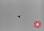 Image of Kamikaze aircraft attacking US ships World War 2 Pacific Ocean, 1944, second 4 stock footage video 65675056747