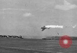 Image of Kamikaze aircraft attacking US ships World War 2 Pacific Ocean, 1944, second 8 stock footage video 65675056747
