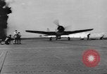 Image of Kamikaze aircraft attacking US ships World War 2 Pacific Ocean, 1944, second 11 stock footage video 65675056747