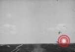 Image of Kamikaze aircraft attacking US ships World War 2 Pacific Ocean, 1944, second 14 stock footage video 65675056747