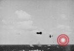 Image of Kamikaze aircraft attacking US ships World War 2 Pacific Ocean, 1944, second 15 stock footage video 65675056747