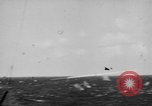 Image of Kamikaze aircraft attacking US ships World War 2 Pacific Ocean, 1944, second 16 stock footage video 65675056747