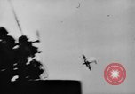 Image of Kamikaze aircraft attacking US ships World War 2 Pacific Ocean, 1944, second 20 stock footage video 65675056747