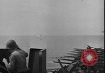 Image of Kamikaze aircraft attacking US ships World War 2 Pacific Ocean, 1944, second 24 stock footage video 65675056747