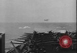 Image of Kamikaze aircraft attacking US ships World War 2 Pacific Ocean, 1944, second 25 stock footage video 65675056747