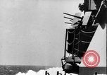Image of Kamikaze aircraft attacking US ships World War 2 Pacific Ocean, 1944, second 33 stock footage video 65675056747