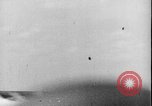 Image of Kamikaze aircraft attacking US ships World War 2 Pacific Ocean, 1944, second 34 stock footage video 65675056747