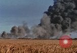 Image of Accidental fire consumes LSTs at Pearl Harbor Oahu Hawaii USA, 1944, second 4 stock footage video 65675056759