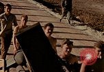 Image of Accidental fire consumes LSTs at Pearl Harbor Oahu Hawaii USA, 1944, second 13 stock footage video 65675056759