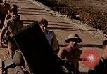 Image of Accidental fire consumes LSTs at Pearl Harbor Oahu Hawaii USA, 1944, second 18 stock footage video 65675056759