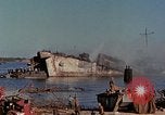 Image of Accidental fire consumes LSTs at Pearl Harbor Oahu Hawaii USA, 1944, second 29 stock footage video 65675056759