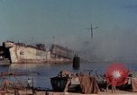Image of Accidental fire consumes LSTs at Pearl Harbor Oahu Hawaii USA, 1944, second 35 stock footage video 65675056759