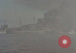 Image of Accidental fire consumes LSTs at Pearl Harbor Oahu Hawaii USA, 1944, second 42 stock footage video 65675056759