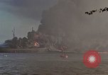 Image of Accidental fire consumes LSTs at Pearl Harbor Oahu Hawaii USA, 1944, second 48 stock footage video 65675056759