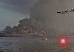 Image of Accidental fire consumes LSTs at Pearl Harbor Oahu Hawaii USA, 1944, second 49 stock footage video 65675056759