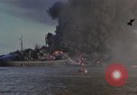 Image of Accidental fire consumes LSTs at Pearl Harbor Oahu Hawaii USA, 1944, second 57 stock footage video 65675056759