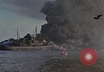 Image of Accidental fire consumes LSTs at Pearl Harbor Oahu Hawaii USA, 1944, second 58 stock footage video 65675056759
