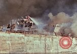 Image of Accidental fire destroys LSTs at West Loch, Pearl Harbor Oahu Hawaii USA, 1944, second 19 stock footage video 65675056760