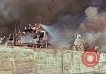 Image of Accidental fire destroys LSTs at West Loch, Pearl Harbor Oahu Hawaii USA, 1944, second 20 stock footage video 65675056760